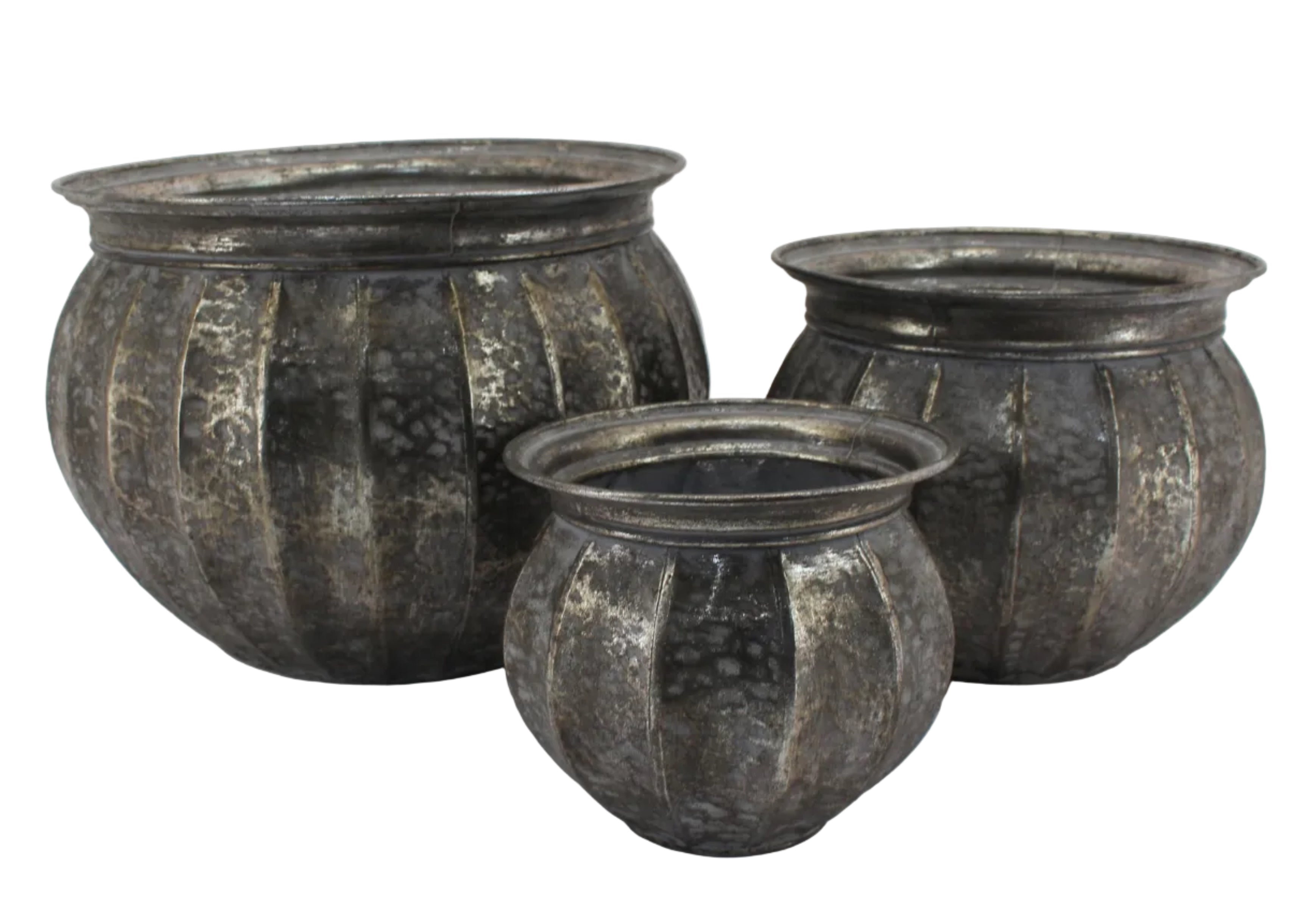 Three metallic pots with textured surfaces