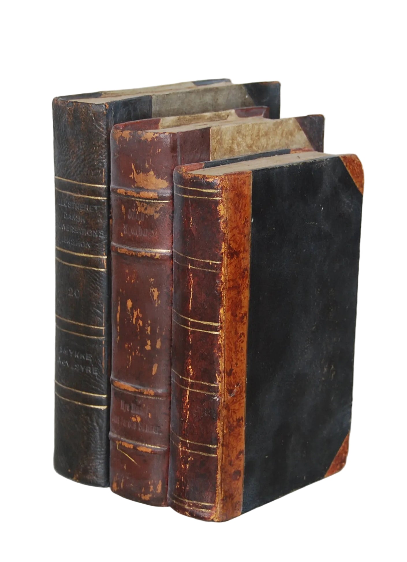 A set of three hardcover books with dark spines and textured brown and black covers, placed in a standing position.