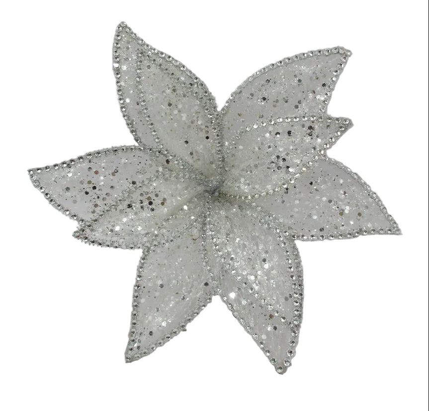 A glittery white artificial flower decoration with silver beaded edges.