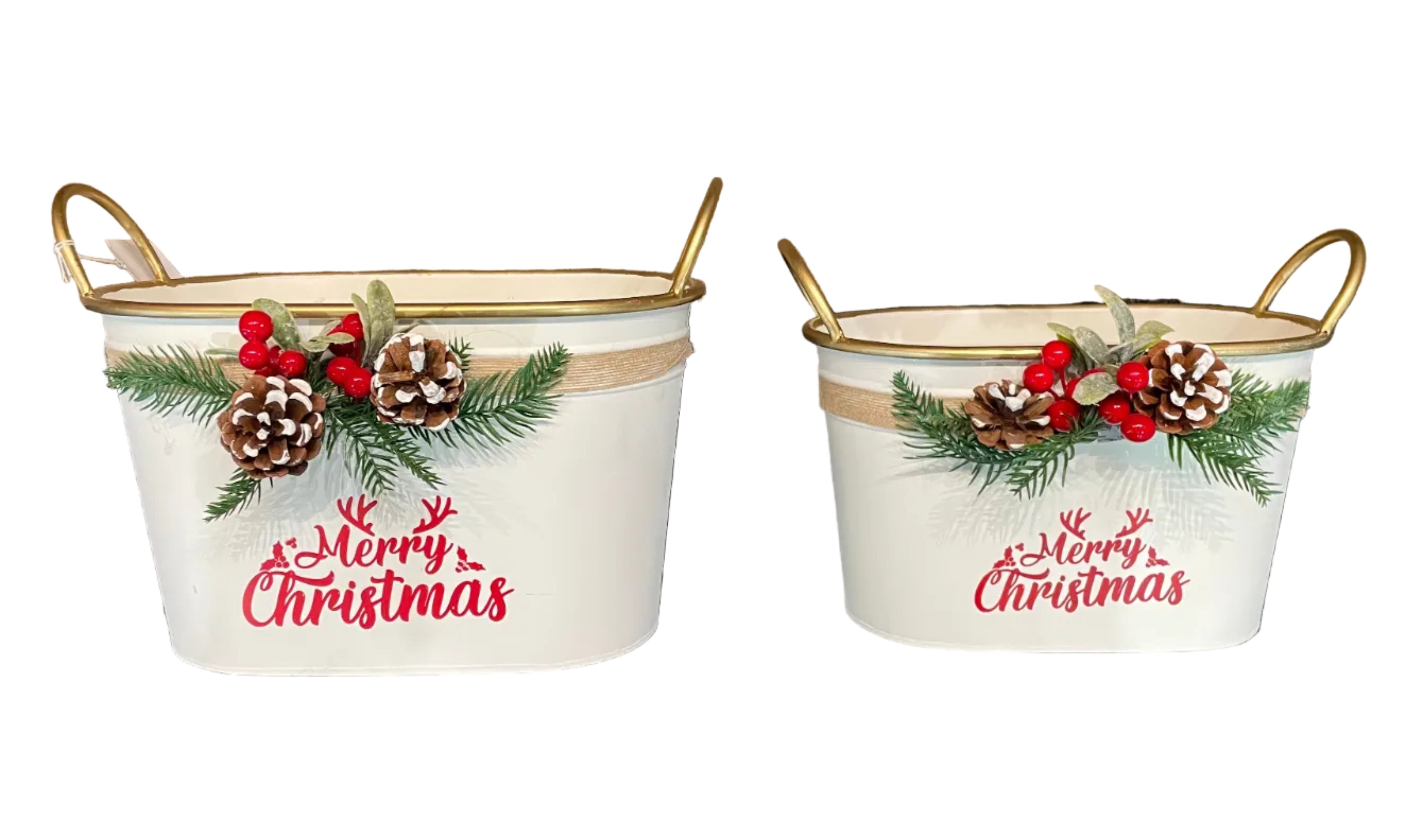 Two white Christmas-themed bucket planters with gold handles, decorated with red script text, pinecones, and green pine branches