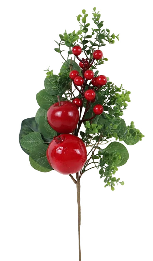 Artificial plant with red berries, red apple, pomegranate and green leaves.