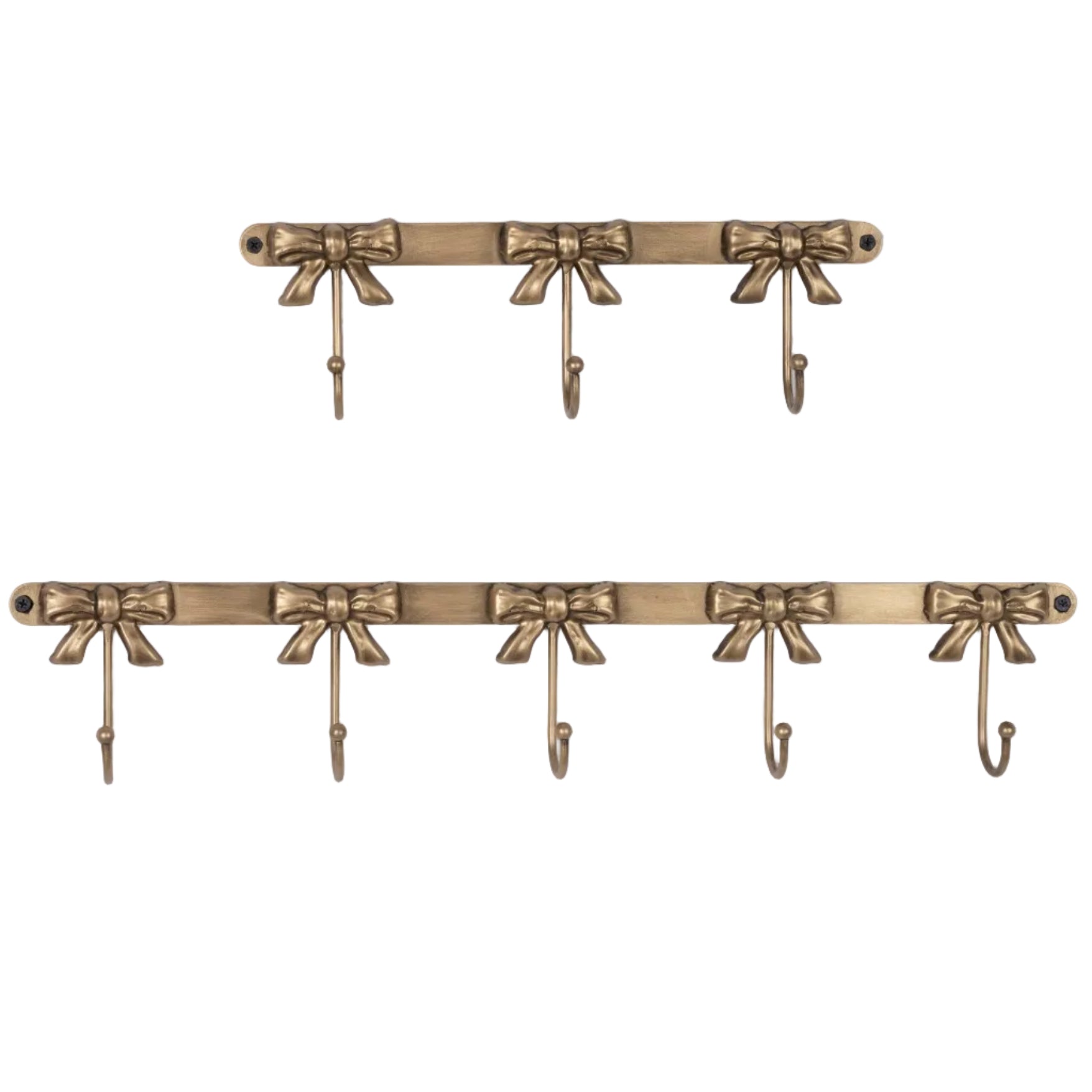 Two brass wall hooks with decorative bows on a light gray background