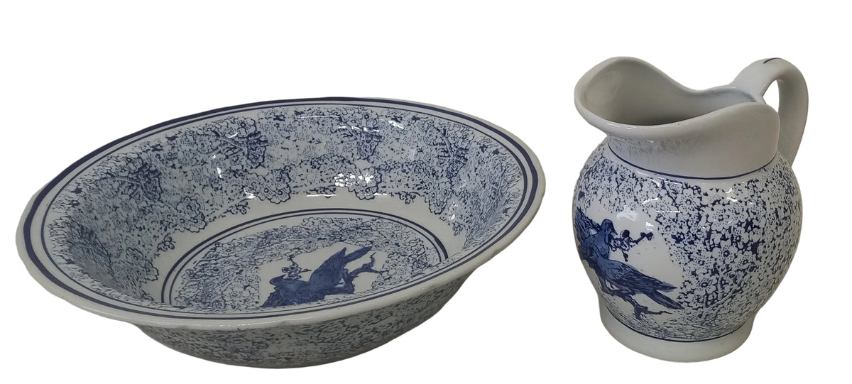 A blue and white ceramic bowl and jug with floral patterns