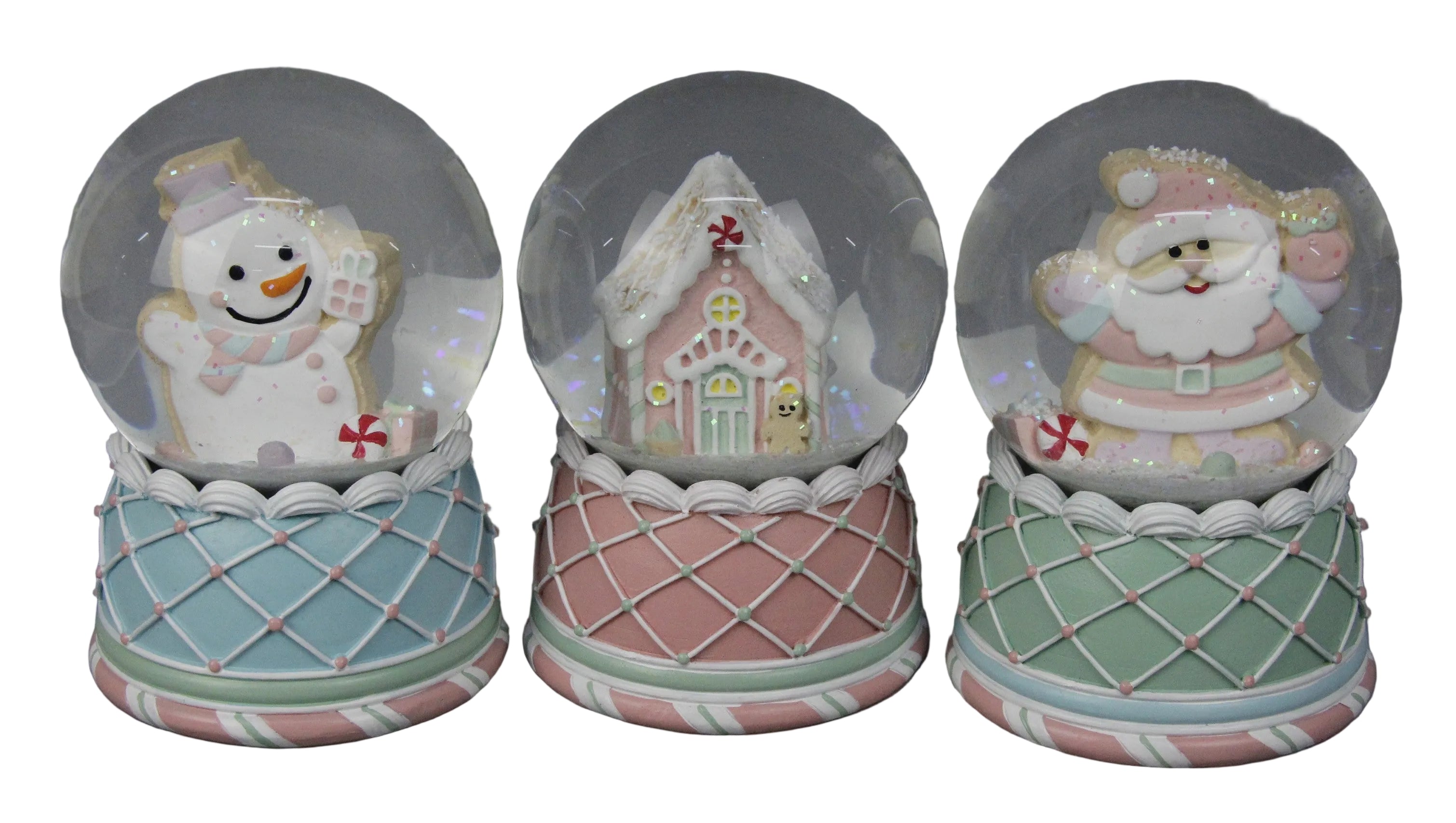 Three decorative snowball-shaped ornaments in pink, green, and blue with various cute figures inside.