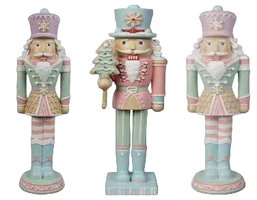 Three decorative standing nutcrackers in pastel colours.