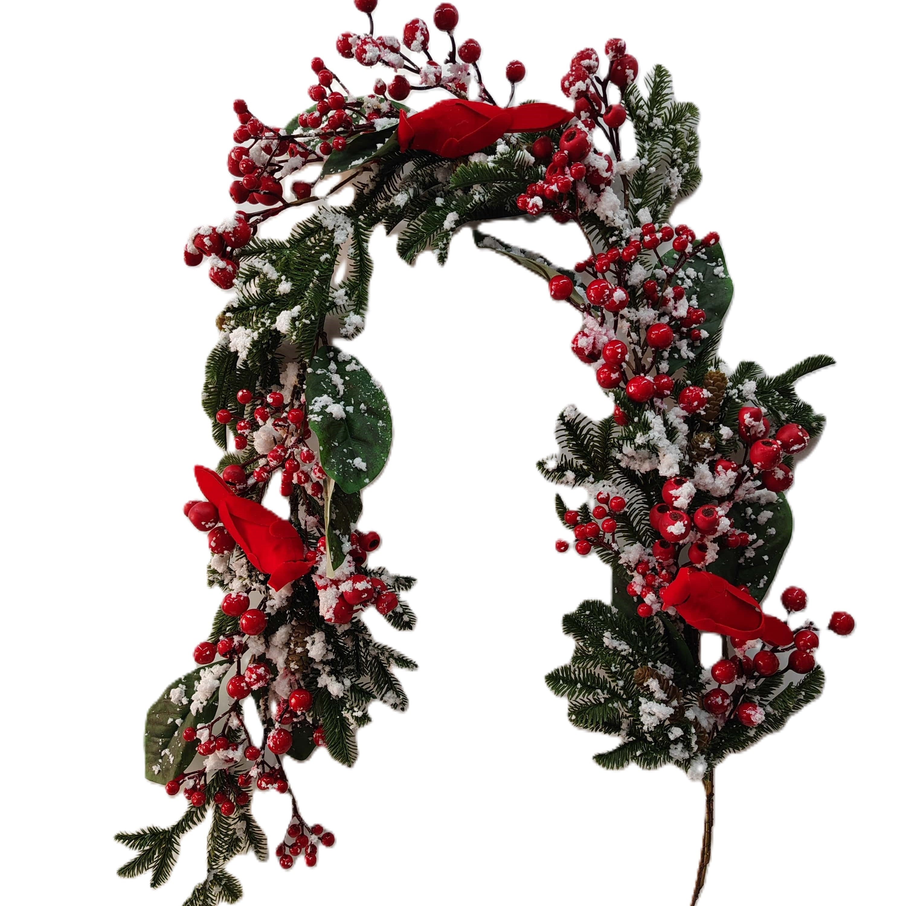 A festive Christmas wreath featuring green pine and holly branches, red berries, white snow-like dusting, and three bright red bird ornaments.
